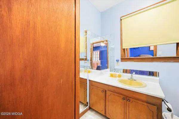 a view of swimming pool with outdoor seating