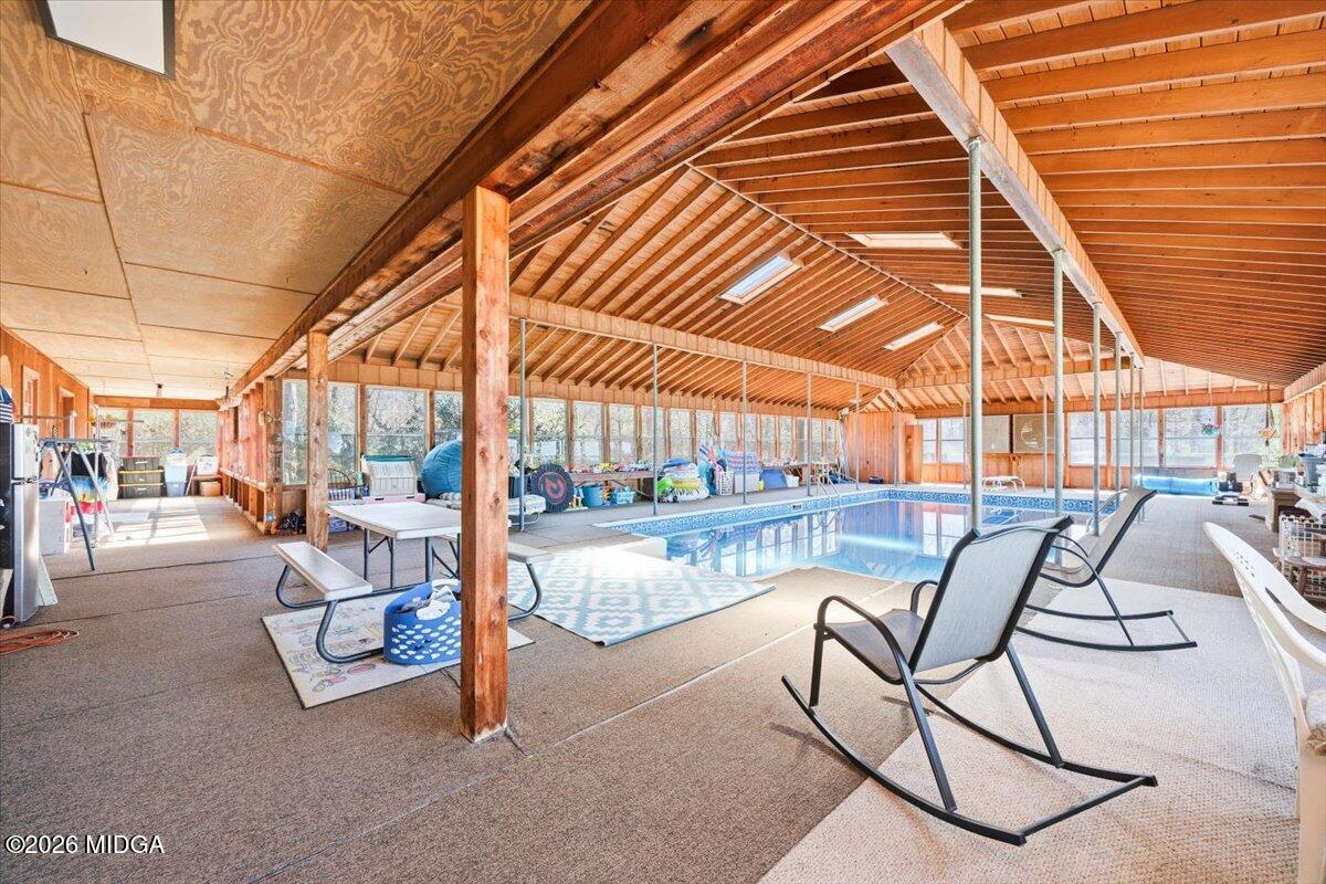 146 Mooring Road Hawkinsville, GA 31036 - Photo 38 of 64 a view of swimming pool with outdoor seating