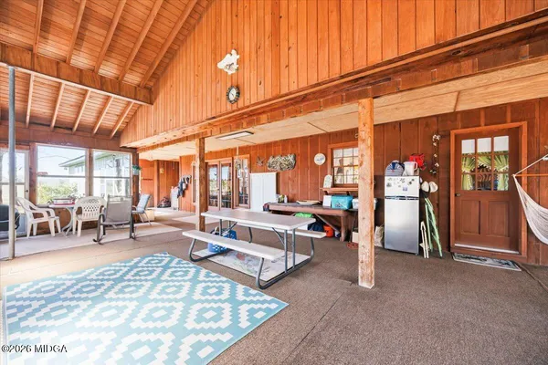 a view of a yard with trees