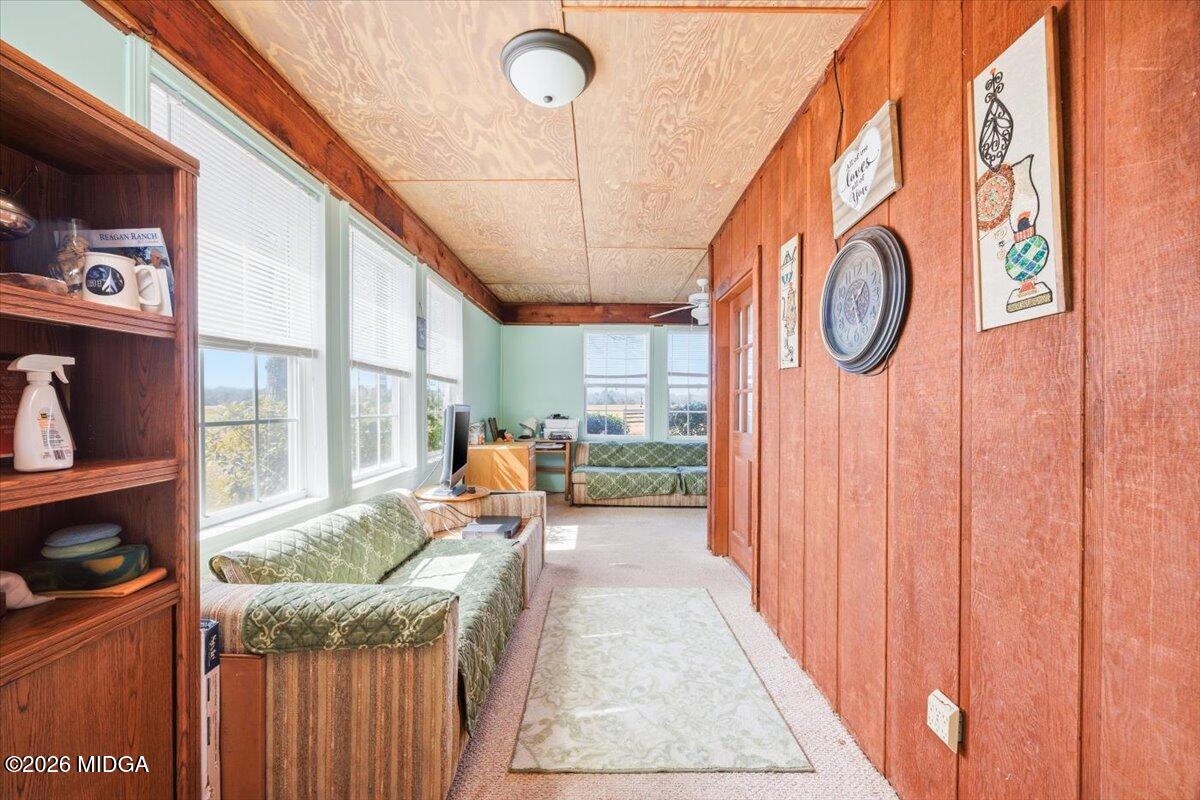 146 Mooring Road Hawkinsville, GA 31036 - Photo 44 of 64 a hallway with furniture and a large window