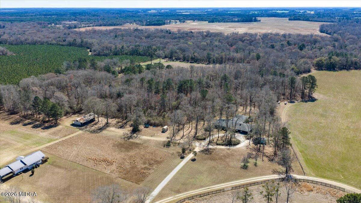 146 Mooring Road Hawkinsville, GA 31036 - Photo 64 of 64 an aerial view of a house with a yard