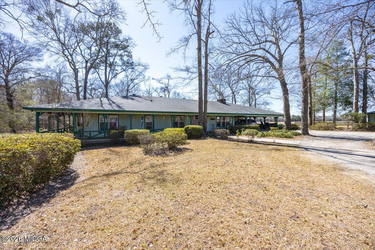 146 Mooring Road Hawkinsville, GA 31036 - Photo 7 of 64 a swimming pool with outdoor seating