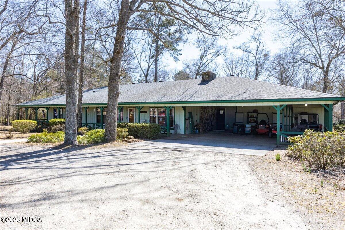146 Mooring Road Hawkinsville, GA 31036 - Photo 8 of 64 a front view of a house with a garden