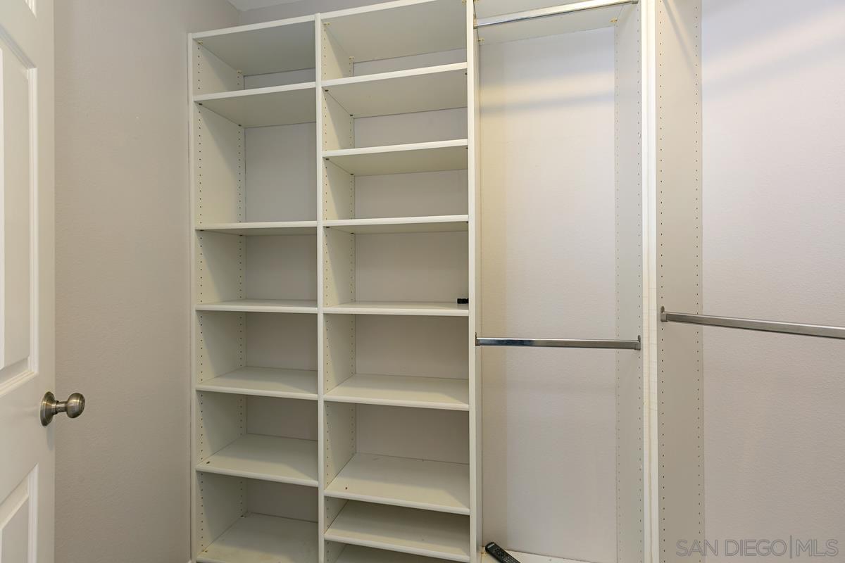4031 Grayson Drive San Diego, CA 92130 - Photo 14 of 27 a view of walk in closet with empty racks