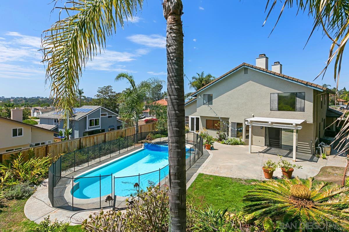 4031 Grayson Drive San Diego, CA 92130 - Photo 24 of 27 a view of a house with a yard