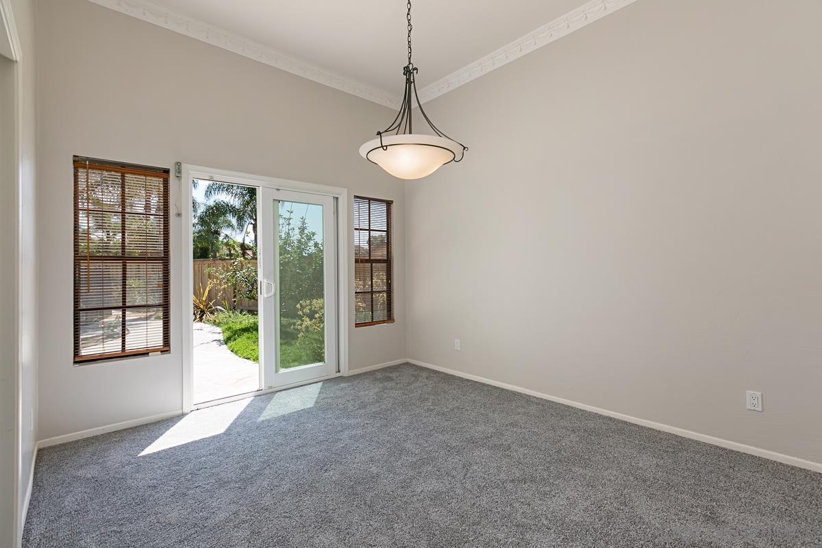 4031 Grayson Drive San Diego, CA 92130 - Photo 8 of 27 a view of an empty room with windows