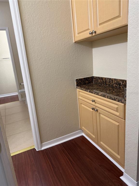 3725 Conroy Road, Unit 2127 Orlando, FL 32839 - Photo 26 of 30 a view of a kitchen with wooden floor