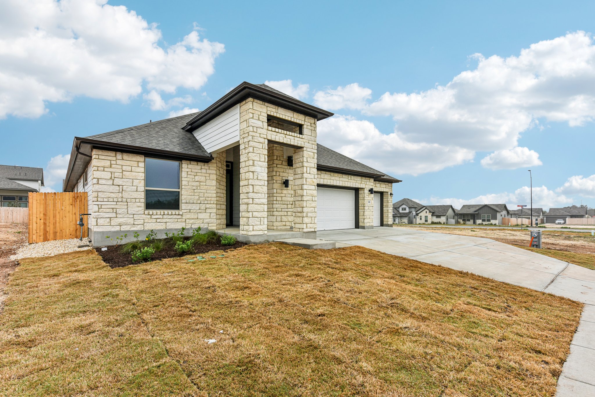 581 Treadwell Lane Kyle, TX 78640 - Photo 1 of 26 a front view of a house with a yard
