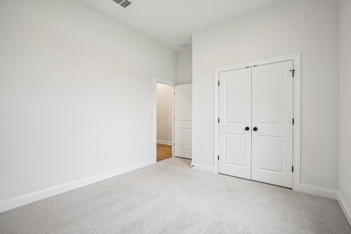 581 Treadwell Lane Kyle, TX 78640 - Photo 11 of 27 a view of an empty room