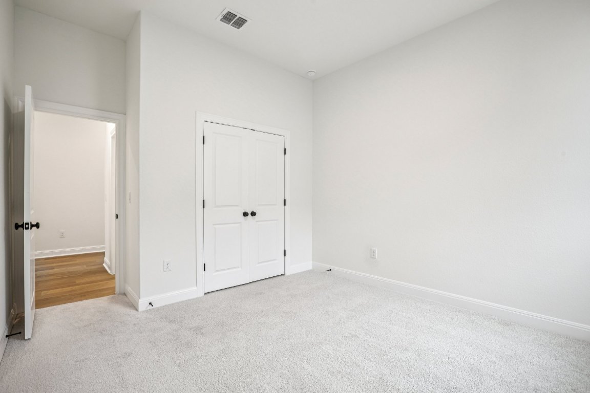 581 Treadwell Lane Kyle, TX 78640 - Photo 16 of 27 an empty room with closet area