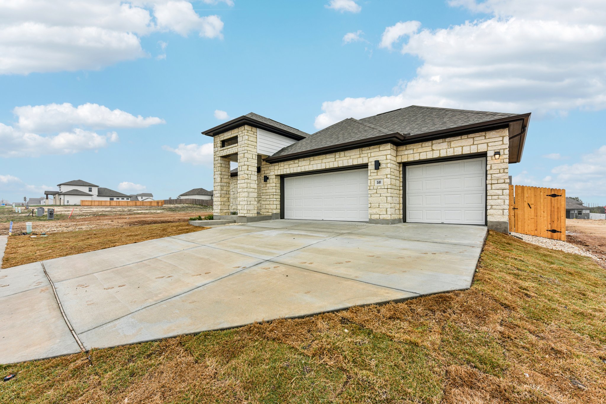 581 Treadwell Lane Kyle, TX 78640 - Photo 2 of 26 a house view with a backyard space