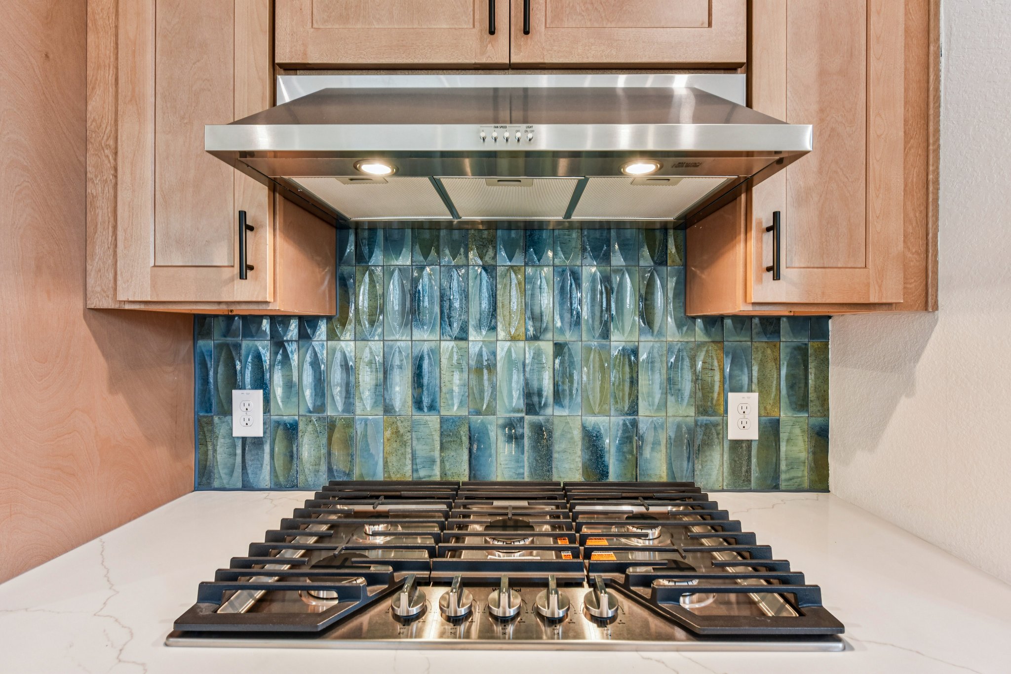 581 Treadwell Lane Kyle, TX 78640 - Photo 6 of 26 a close view of a stove a microwave and cabinets