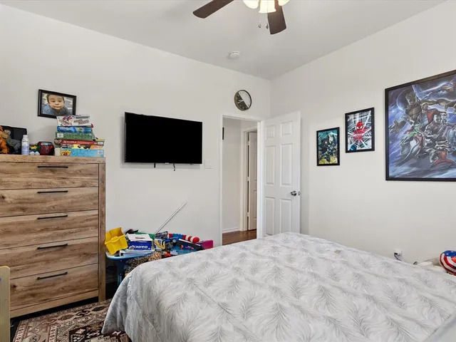a view of workspace with wooden floor windows