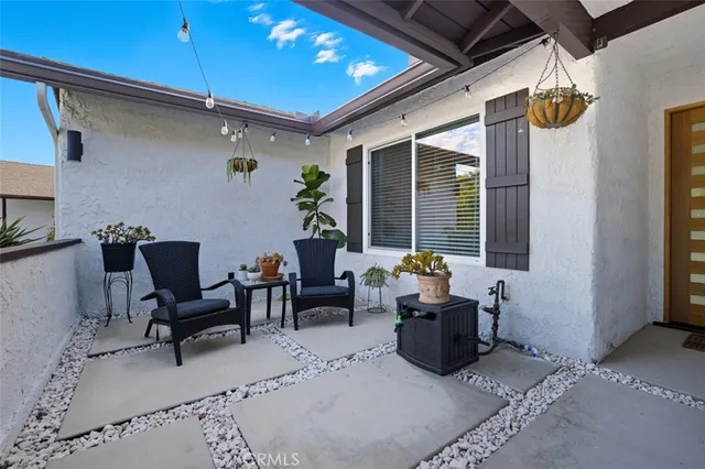 a work room with furniture and wooden floor