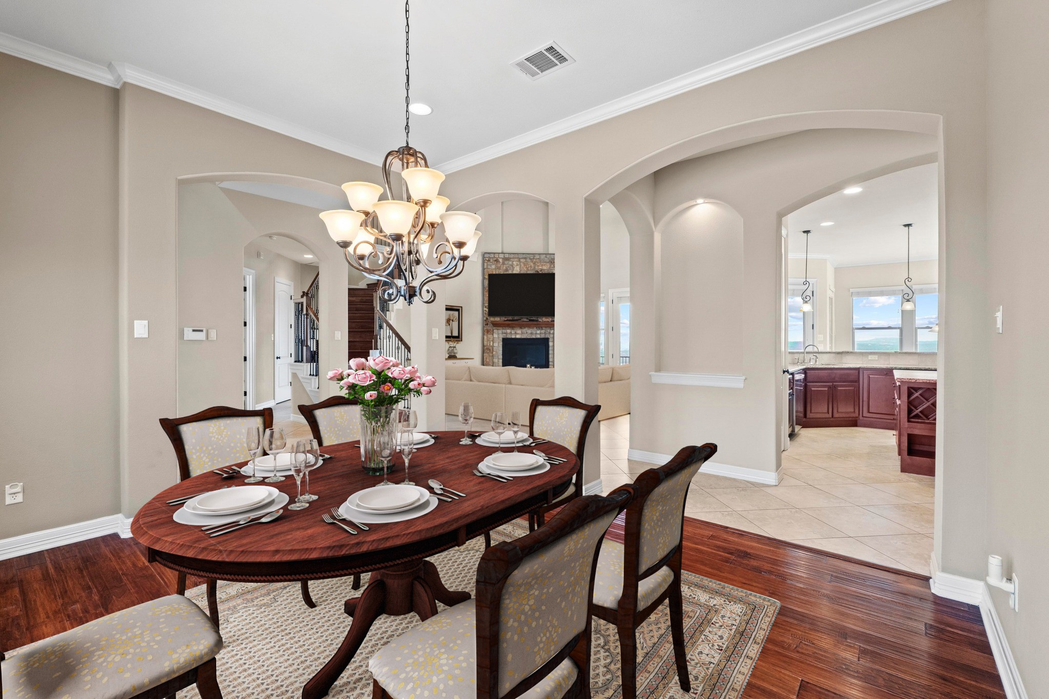 8293 Lime Creek Road Leander, TX 78641 - Photo 27 of 38 a view of a dining room with furniture and chandelier