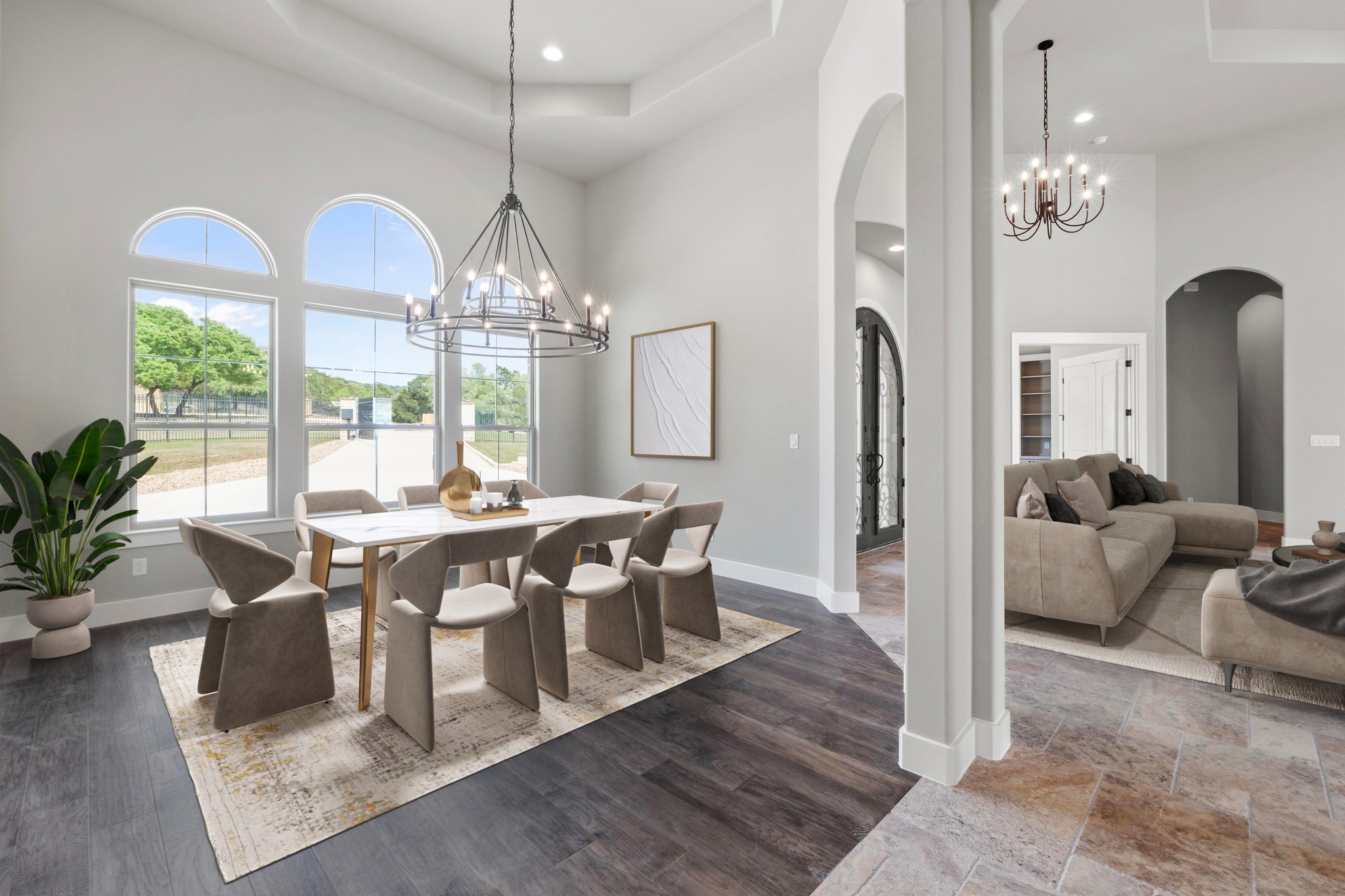 8293 Lime Creek Road Leander, TX 78641 - Photo 9 of 38 a view of a dining room with furniture a chandelier and wooden floor
