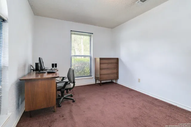 a view of workspace with furniture