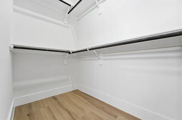 a view of a room with racks on the wall