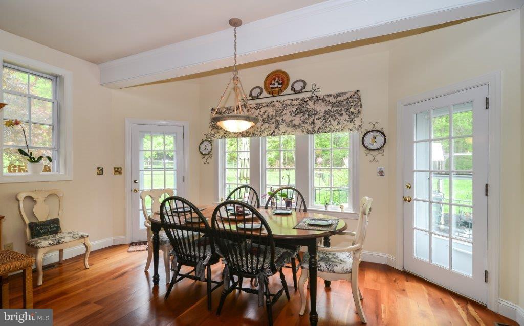 1403 Steeple Chase Road Downingtown, PA 19335 - Photo 12 of 37 Breakfast Room w/2 Doors to Decks/Patios!