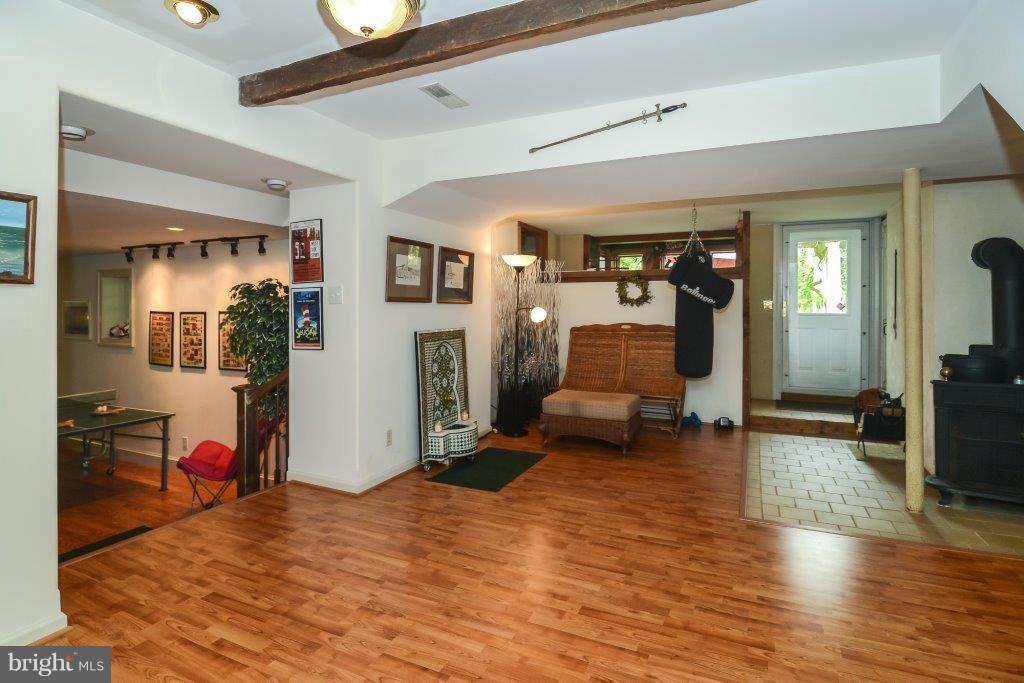 1403 Steeple Chase Road Downingtown, PA 19335 - Photo 33 of 37 FINISHED LOWER LEVEL! -- Fitness Area & Hobby Rm!