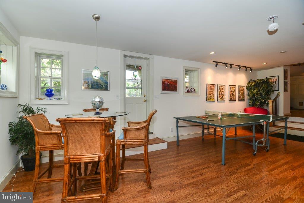 1403 Steeple Chase Road Downingtown, PA 19335 - Photo 36 of 37 FINISHED LOWER LEVEL! -- Game Room & Door to Yards