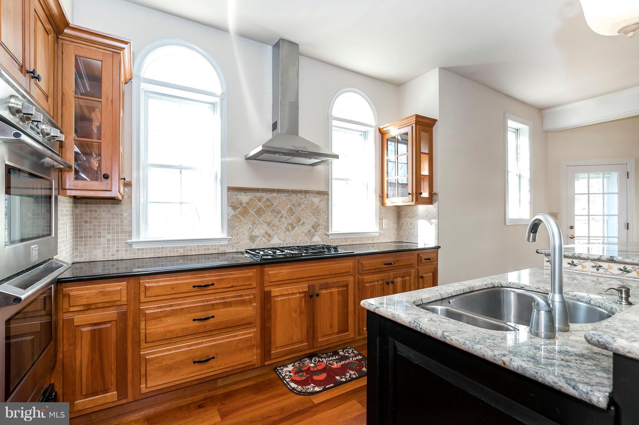1403 Steeple Chase Road Downingtown, PA 19335 - Photo 7 of 37 Granite Counters & NEW Stainless Steel Range Vent!
