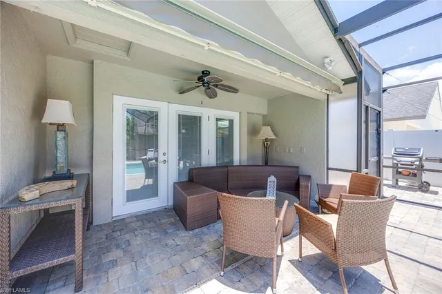 a view of a livingroom with furniture and windows