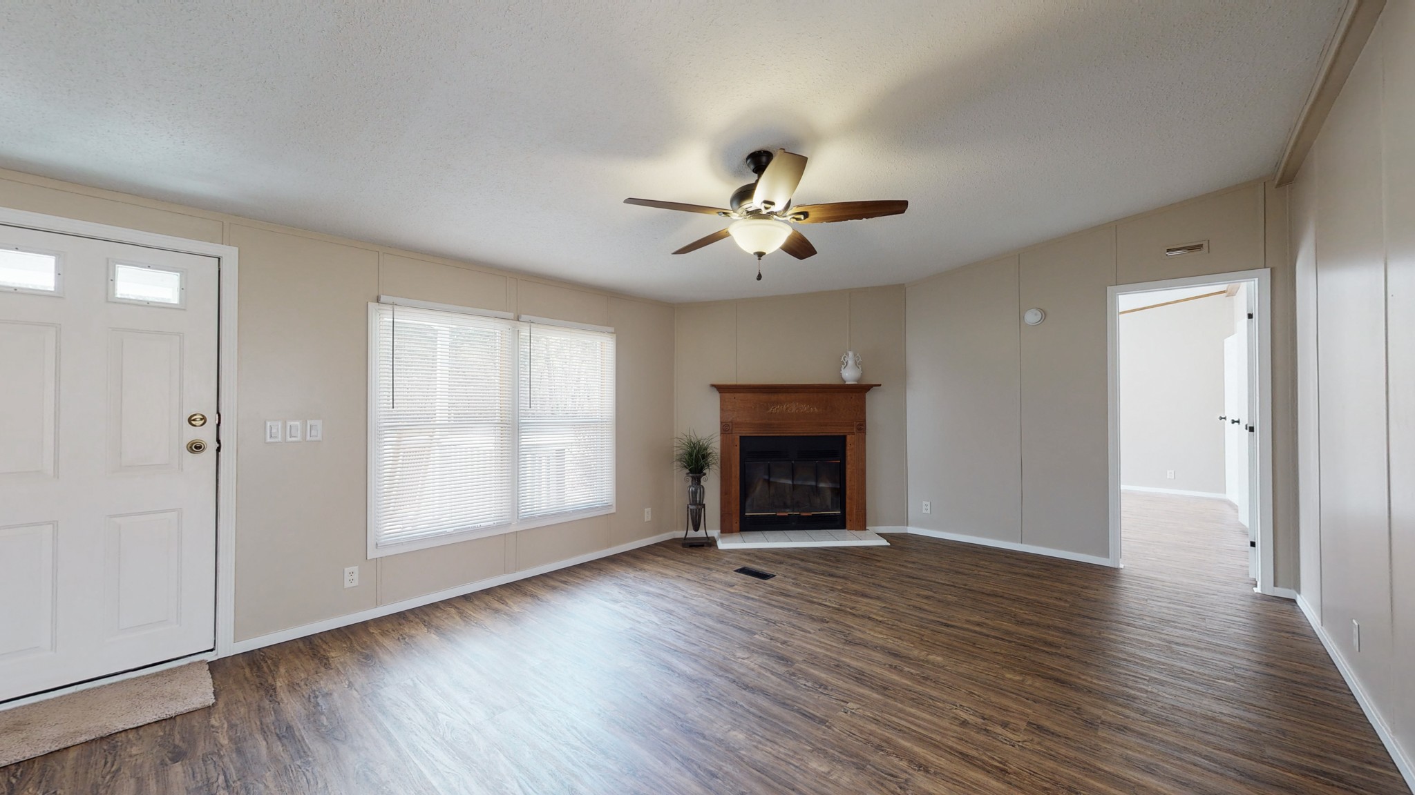 390 Stagecoach Road White Bluff, TN 37187 - Photo 3 of 33 Family Room. Wood fireplace, ceiling fan.