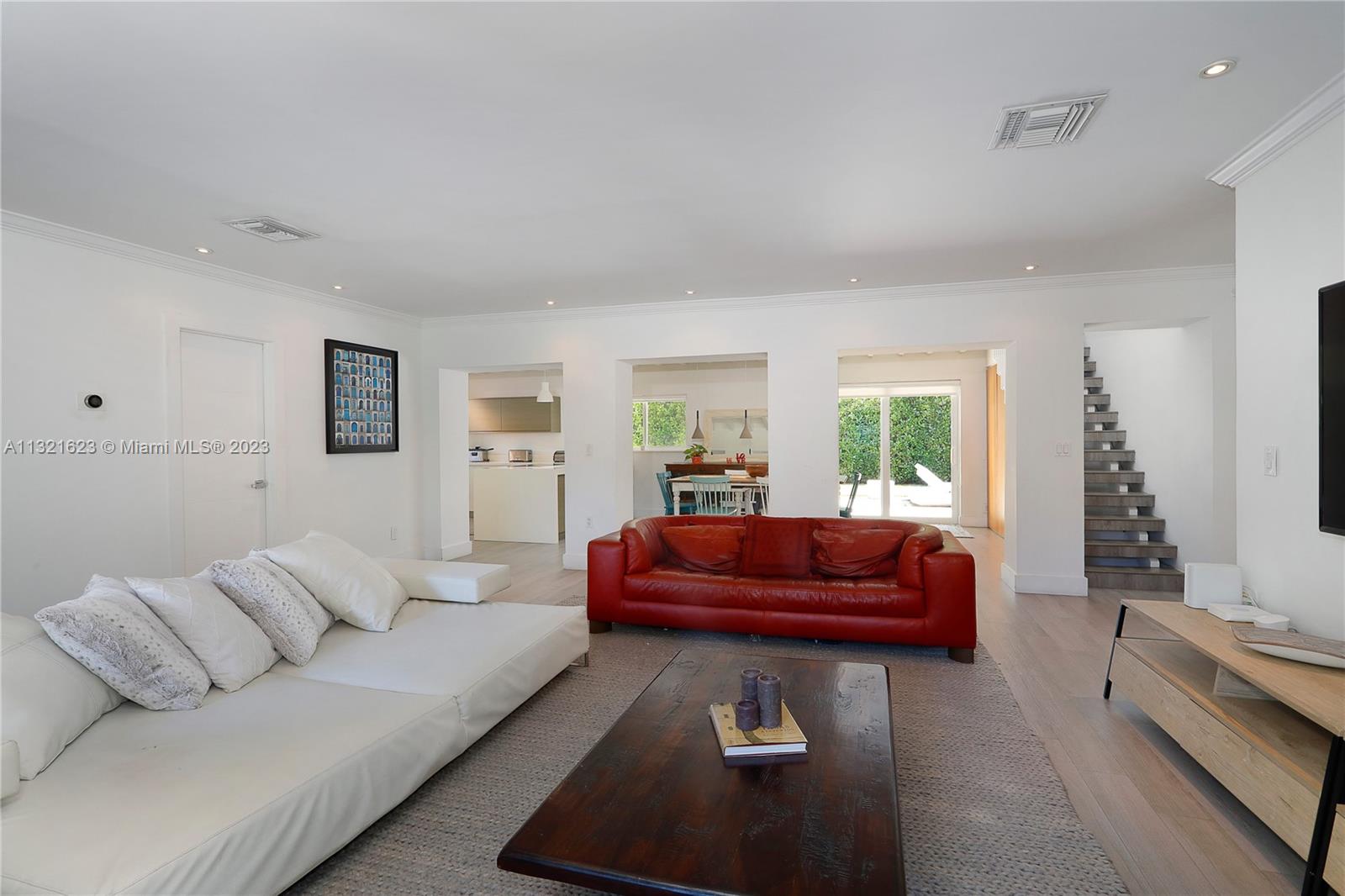 425 Glenridge Road Key Biscayne, FL 33149 - Photo 7 of 37 a living room with furniture and a large window