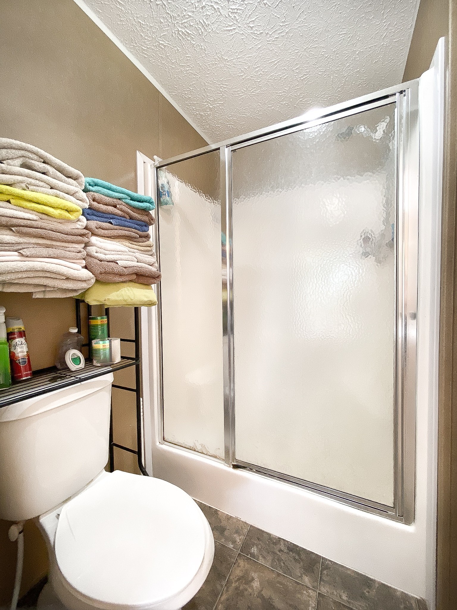 1260 Toy Denny Road Bradyville, TN 37026 - Photo 18 of 30 a bathroom with a toilet and a shower