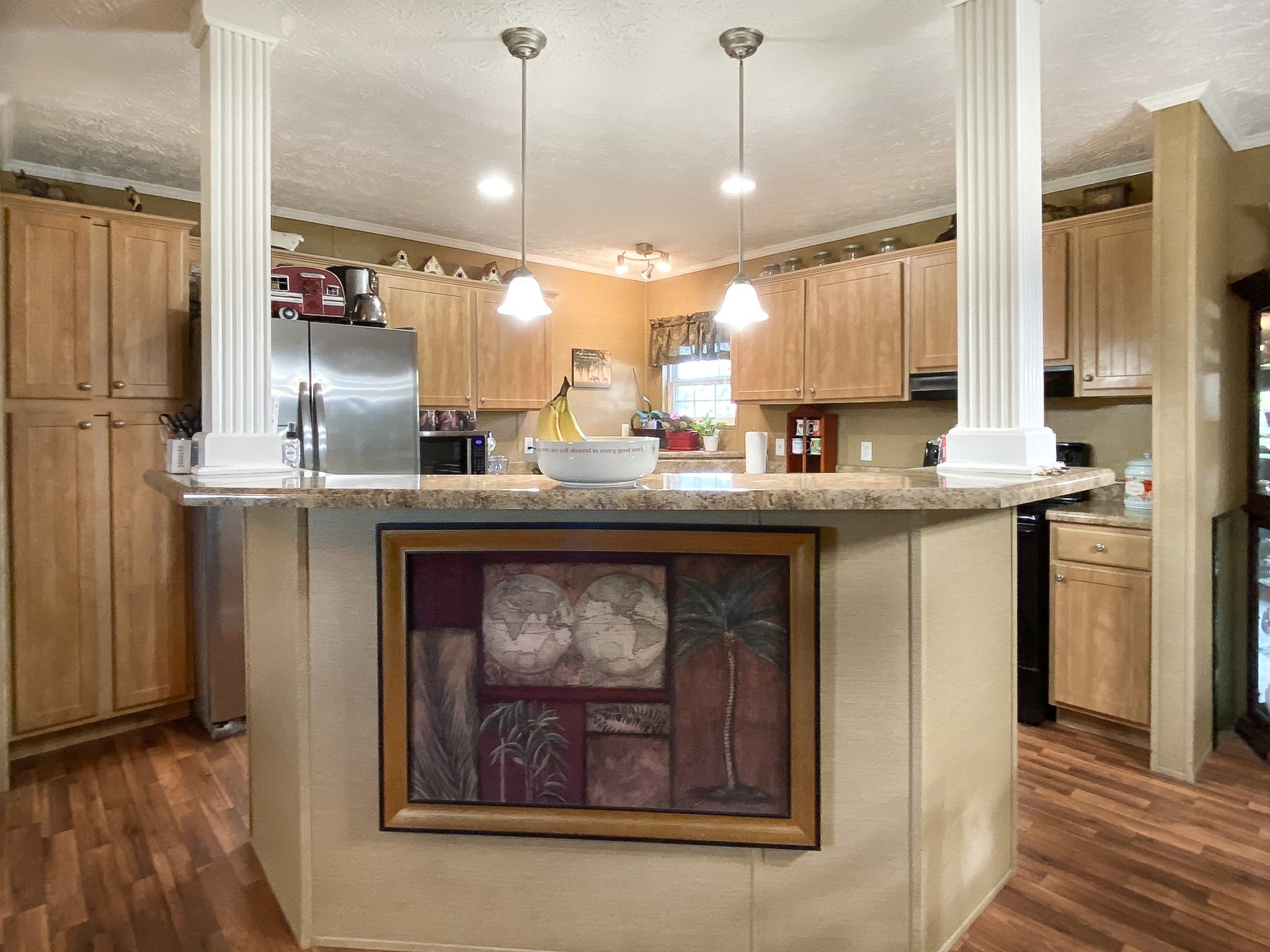 1260 Toy Denny Road Bradyville, TN 37026 - Photo 10 of 30 a kitchen with a sink a counter space appliances and cabinets