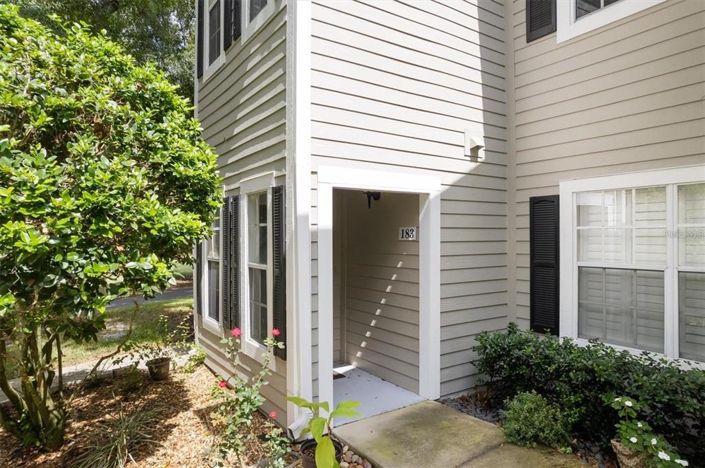 10000 Southwest 52nd Avenue, Unit EE 183 Gainesville, FL 32608 - Photo 13 of 16 a view of a house with a tree