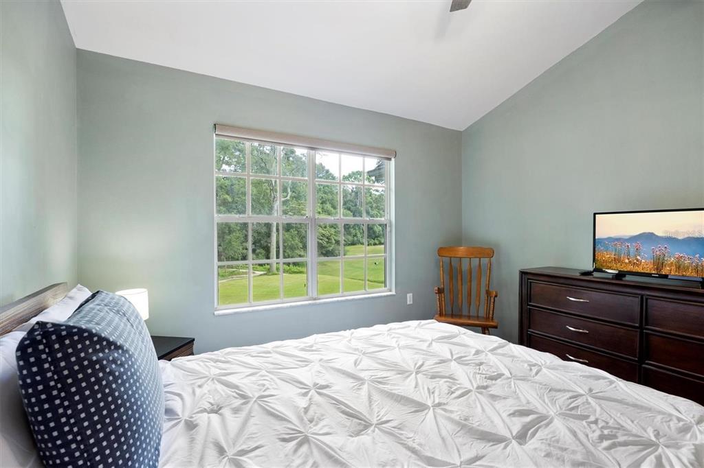 10000 Southwest 52nd Avenue, Unit EE 183 Gainesville, FL 32608 - Photo 4 of 16 a bedroom with a bed and a window