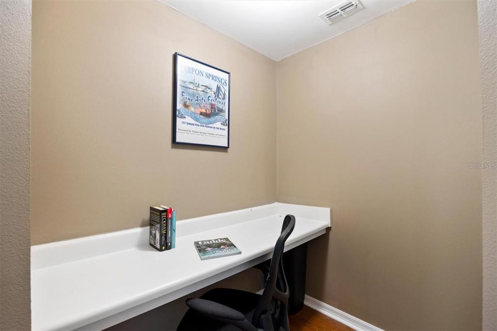 10000 Southwest 52nd Avenue, Unit EE 183 Gainesville, FL 32608 - Photo 10 of 16 a view of a workspace with furniture