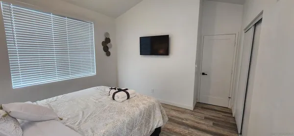 a bathroom with a bathtub and a window