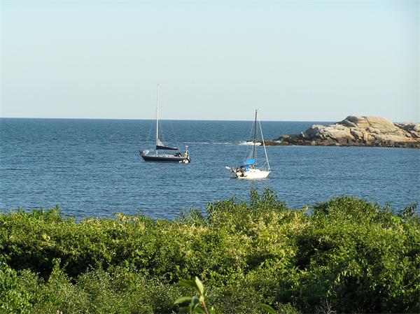 10 Brace Cove Gloucester, MA 01930 - Photo 2 of 13 a backyard of a house with lots of green space