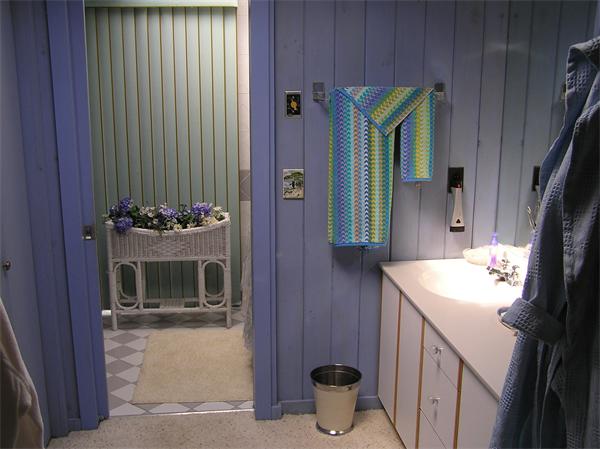 10 Brace Cove Gloucester, MA 01930 - Photo 9 of 13 a bathroom with a sink and mirror with toilet