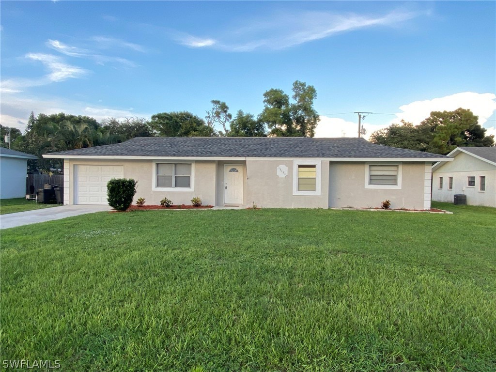 19157 Coconut Road Fort Myers, FL 33967 - Photo 1 of 26 a view of a house with a backyard