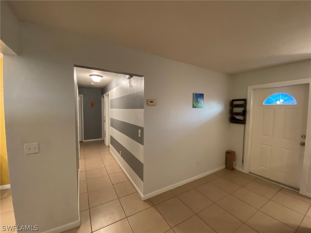 19157 Coconut Road Fort Myers, FL 33967 - Photo 14 of 26 a view of a hallway to rooms