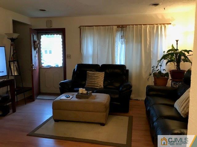 35 Caldwell Road Edison, NJ 08817 - Photo 2 of 16 a living room with furniture and a window