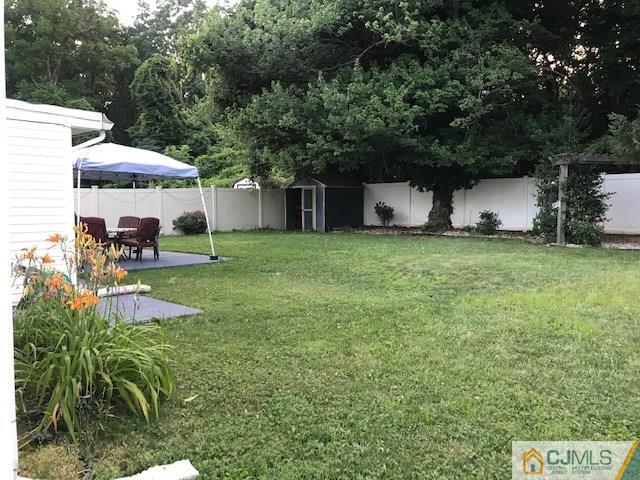 35 Caldwell Road Edison, NJ 08817 - Photo 11 of 16 a view of a house with backyard and sitting area