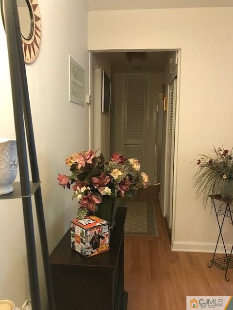 35 Caldwell Road Edison, NJ 08817 - Photo 7 of 16 a vase of flowers sitting on a floor