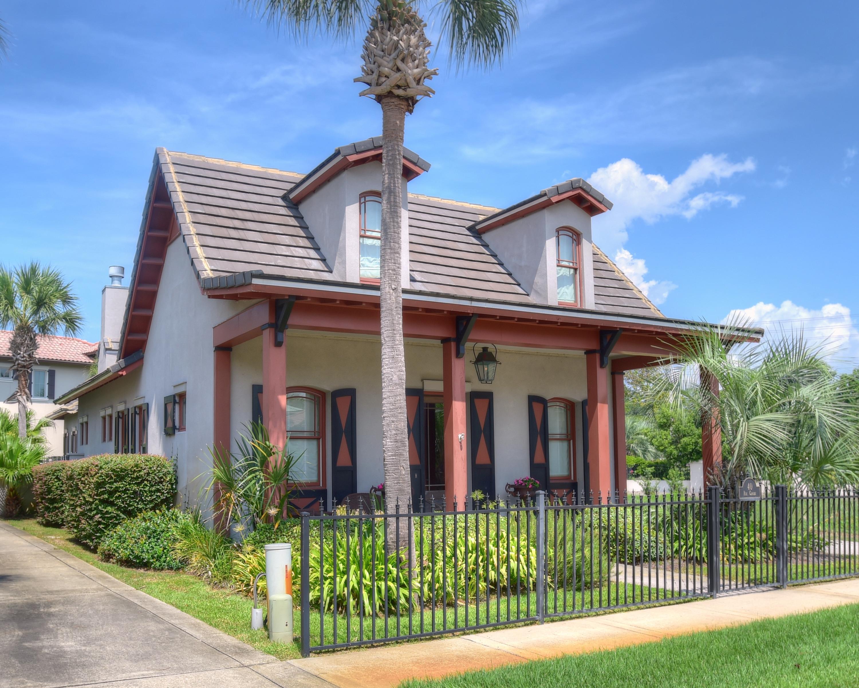 40 Rue Caribe Miramar Beach, FL 32550 - Photo 1 of 64 front view of a house with a garden