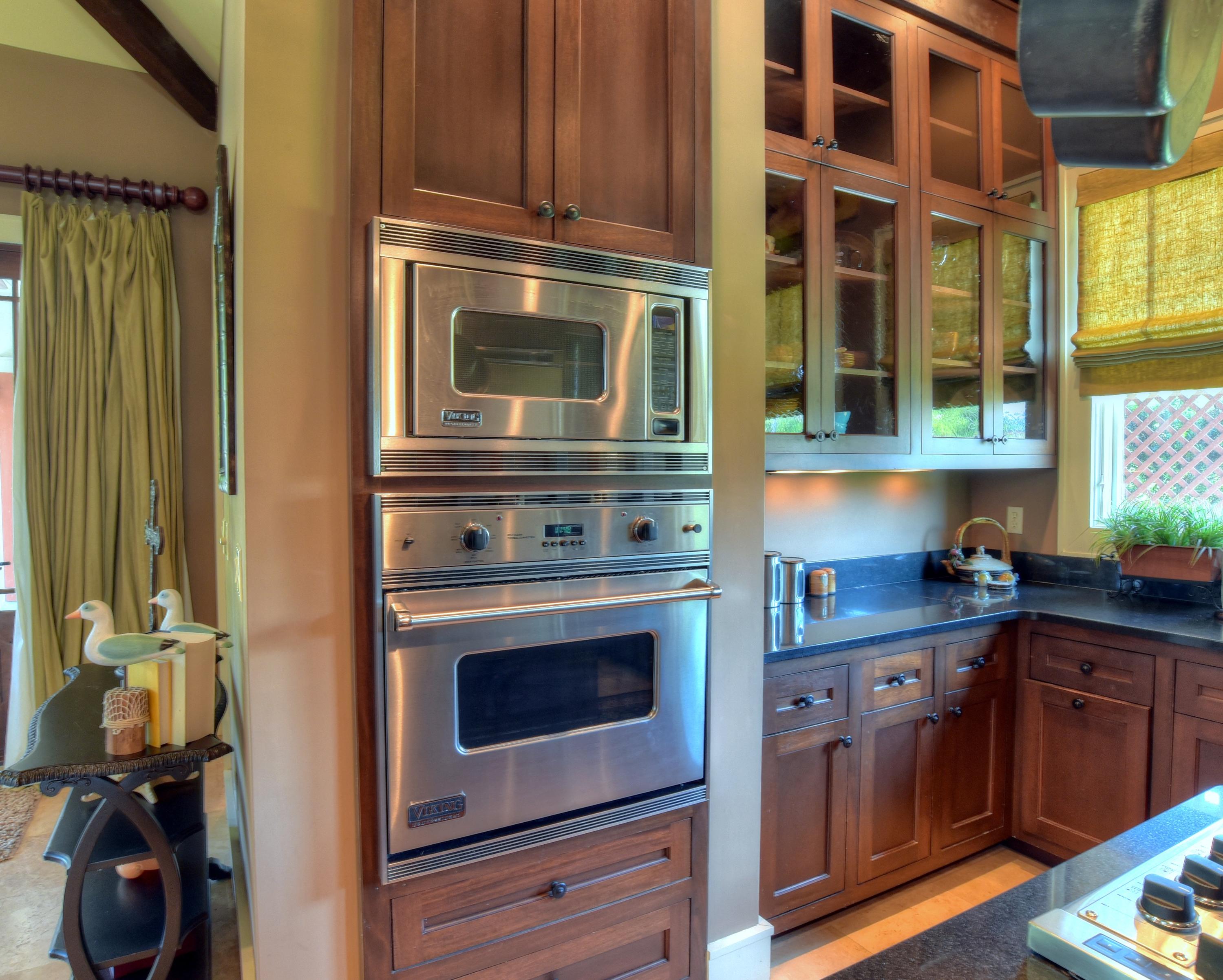40 Rue Caribe Miramar Beach, FL 32550 - Photo 17 of 64 a kitchen with stainless steel appliances granite countertop a stove and a microwave