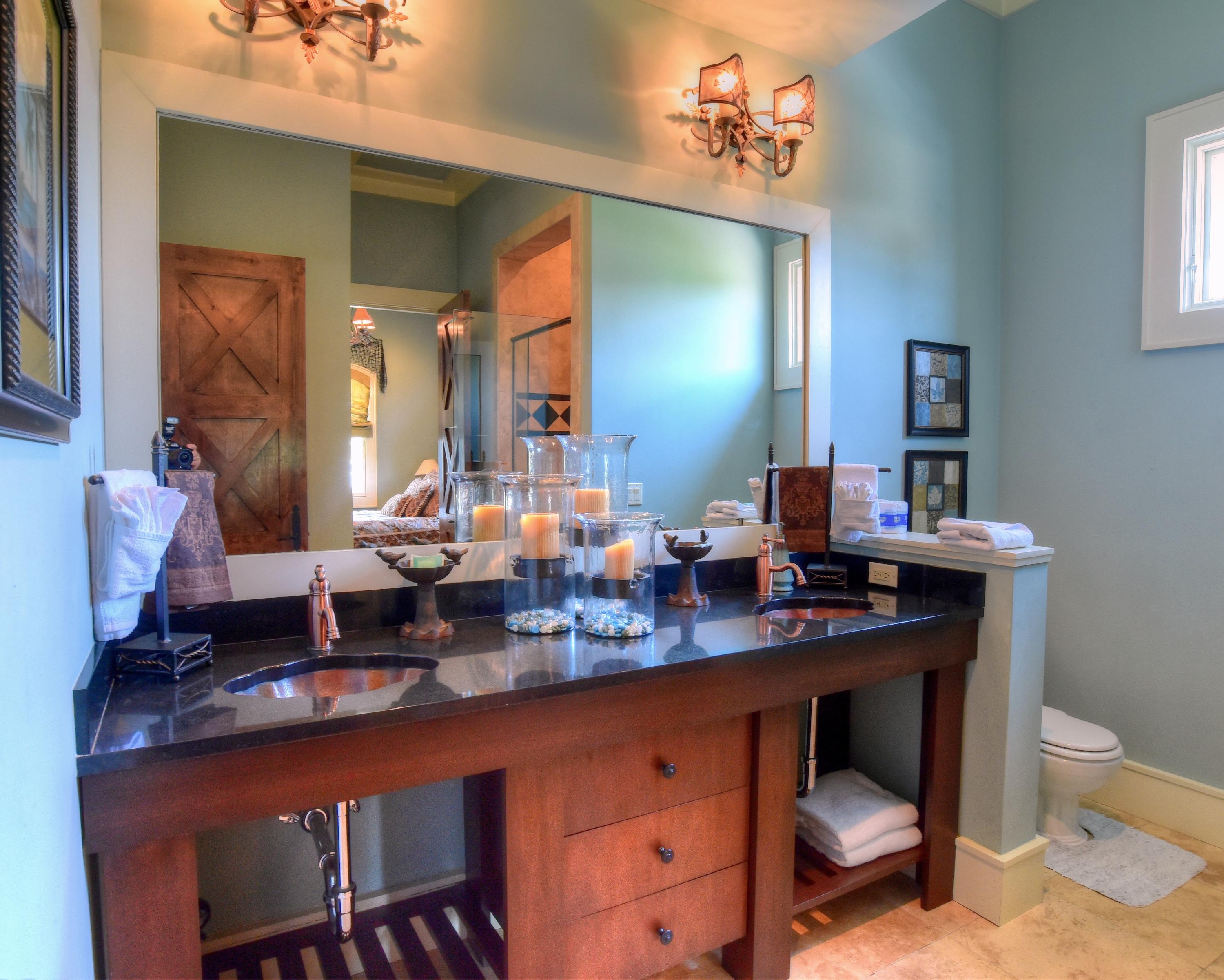 40 Rue Caribe Miramar Beach, FL 32550 - Photo 22 of 64 a room with granite countertop a sink and a stove with chairs