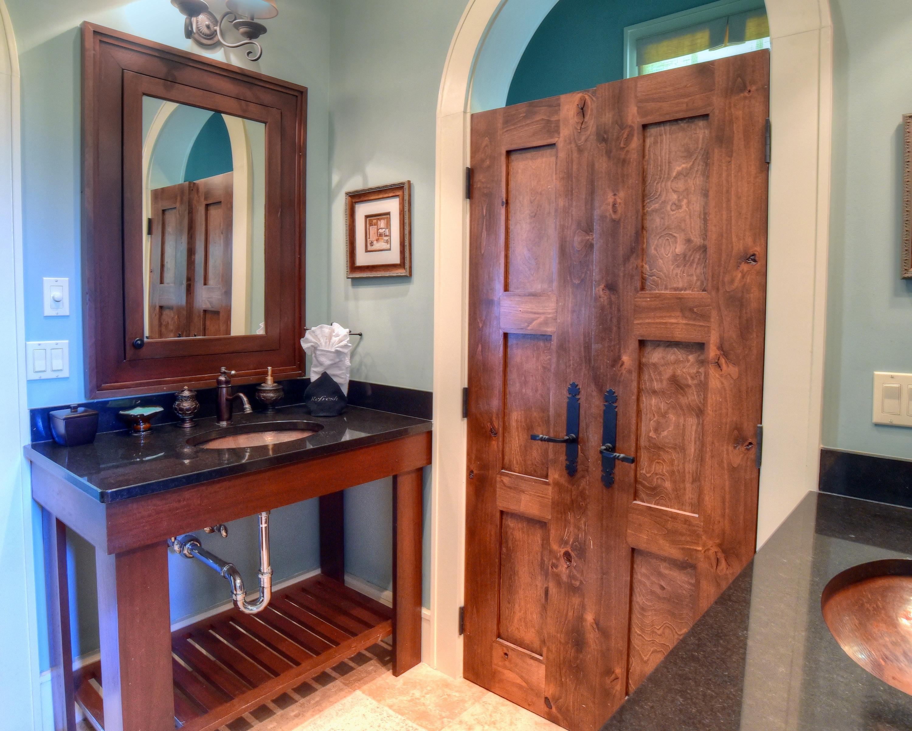 40 Rue Caribe Miramar Beach, FL 32550 - Photo 43 of 64 a bathroom with a sink a mirror and shower