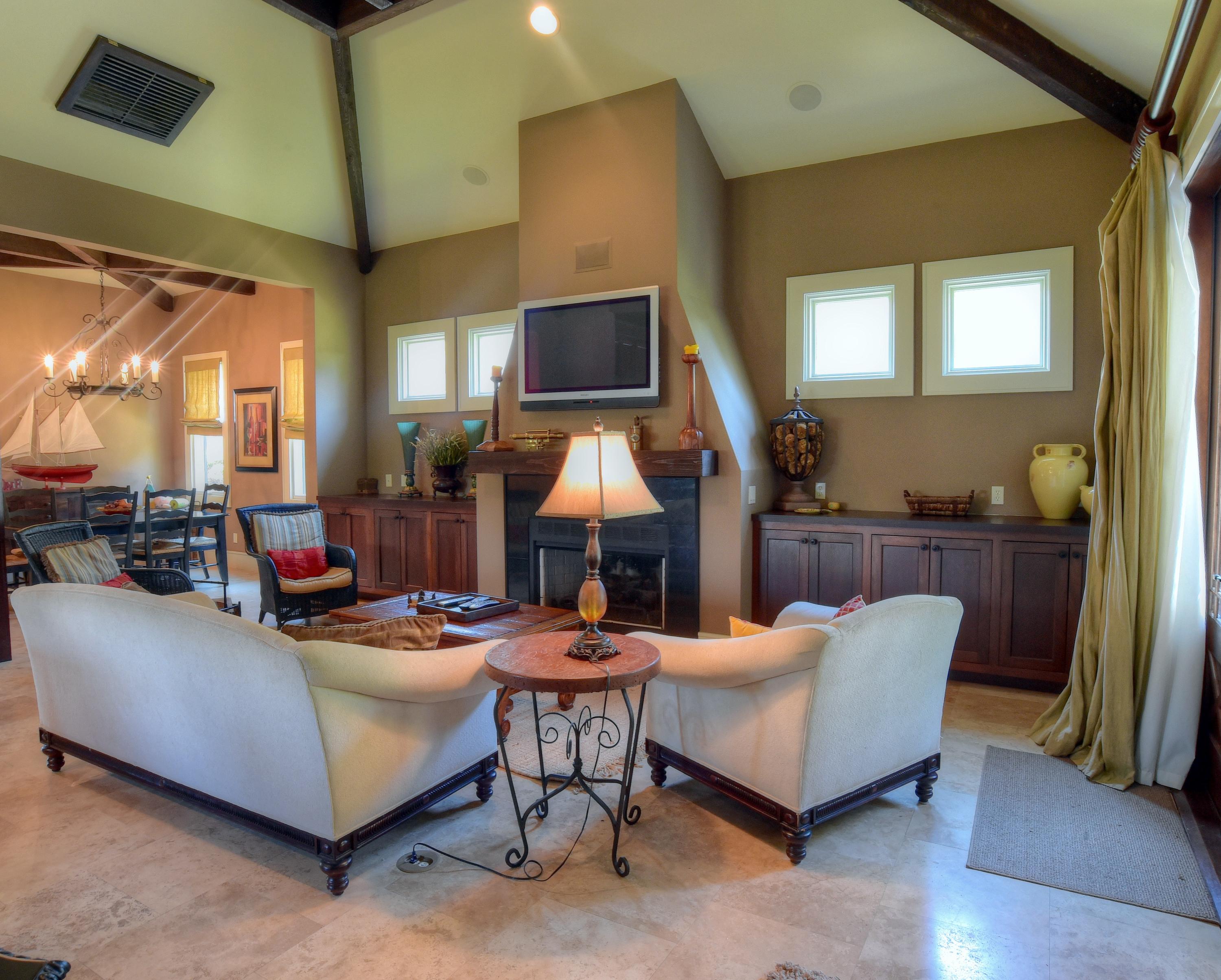 40 Rue Caribe Miramar Beach, FL 32550 - Photo 5 of 64 a living room with furniture fireplace and a flat screen tv