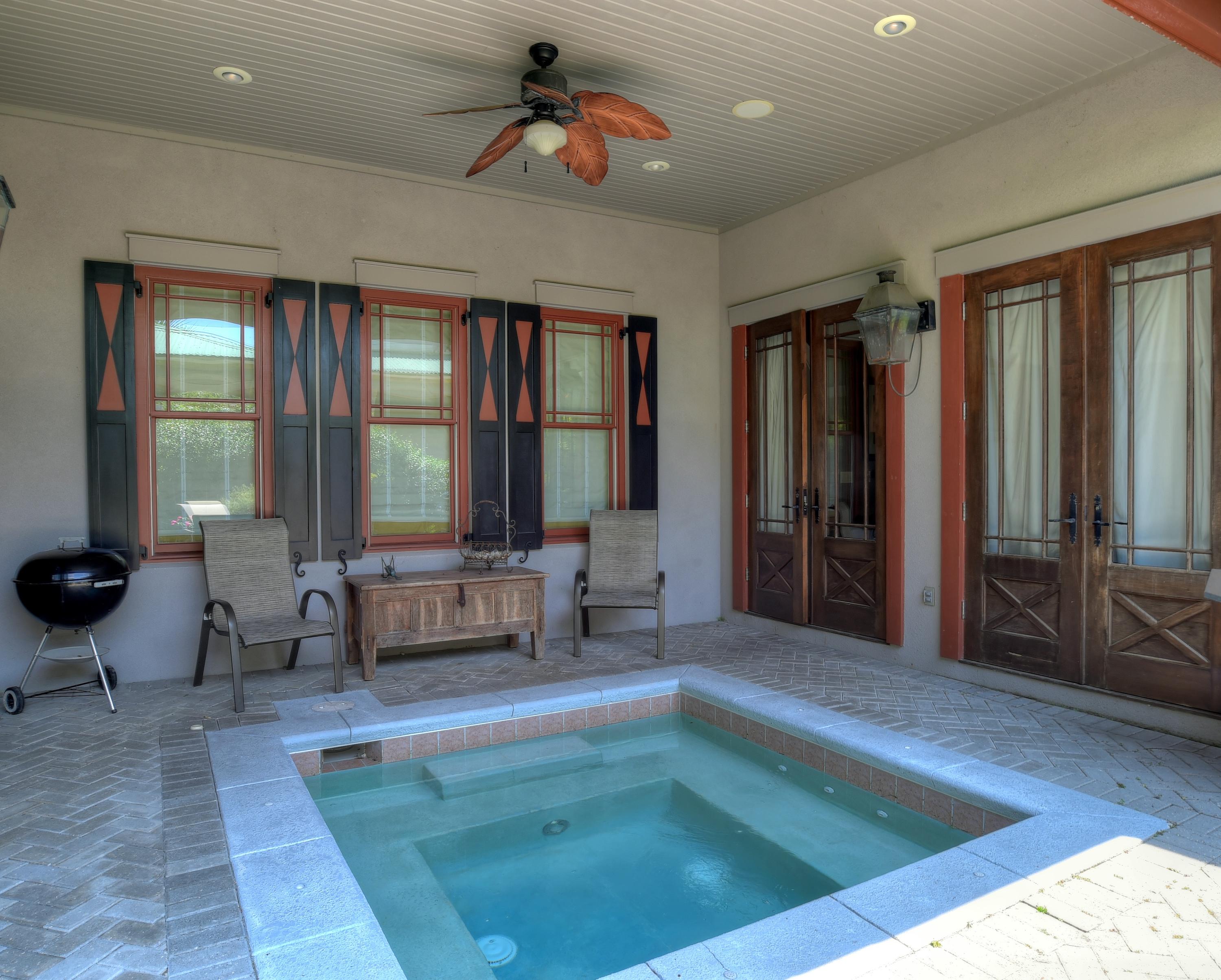 40 Rue Caribe Miramar Beach, FL 32550 - Photo 51 of 64 a living room with furniture and large windows