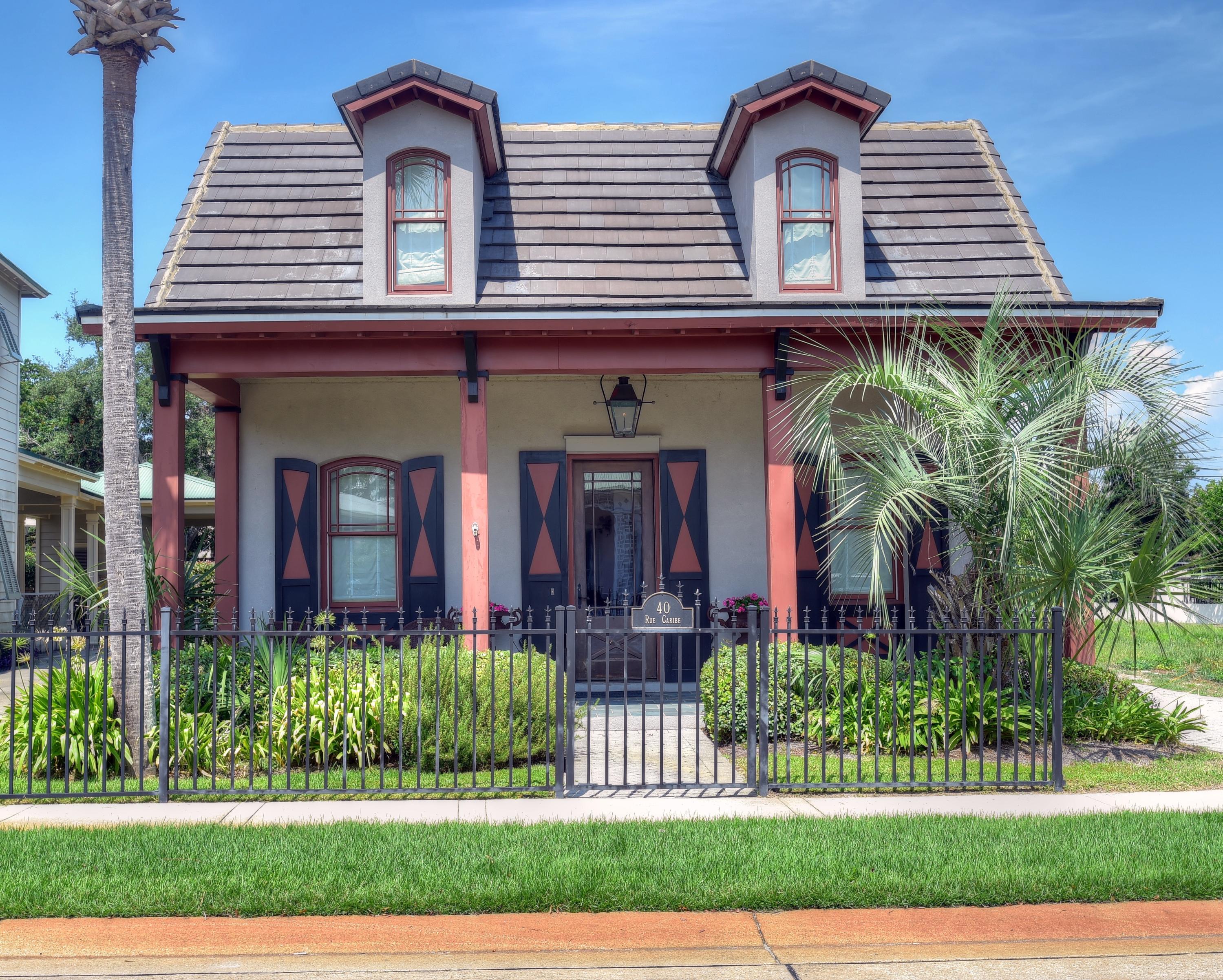 40 Rue Caribe Miramar Beach, FL 32550 - Photo 57 of 64 a front view of a house with a yard