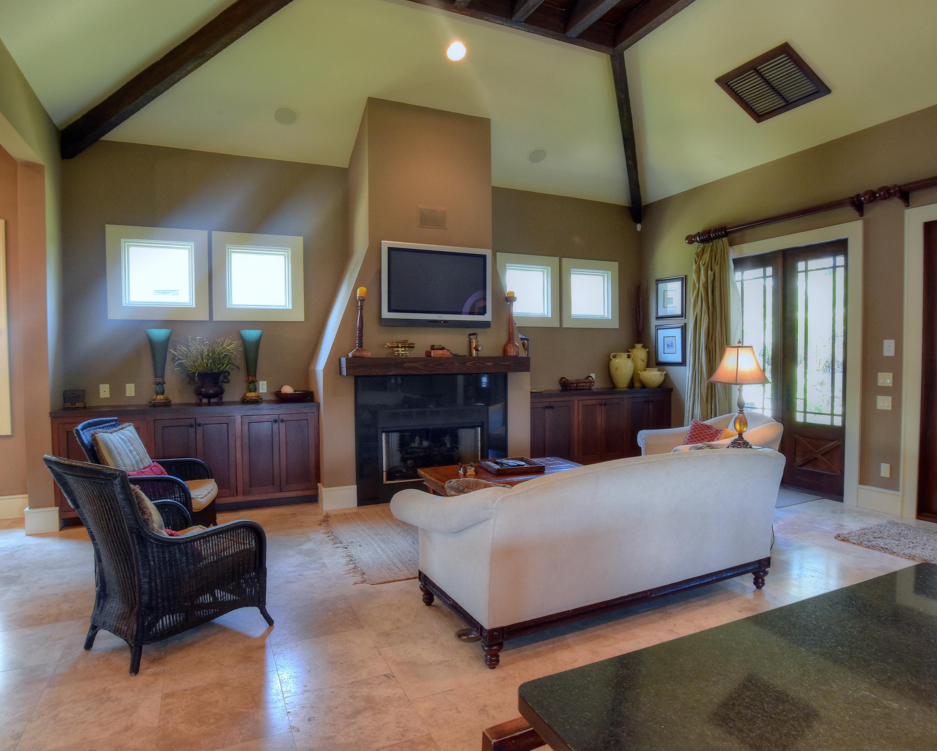 40 Rue Caribe Miramar Beach, FL 32550 - Photo 7 of 64 a bedroom with furniture and a fireplace